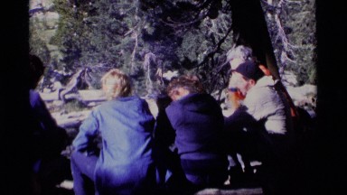 1975: family of 5 sitting in nature MINARET WILDERNESS CALIFORNIA