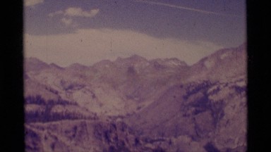1975: desolate rocky valleys and hills with jet overhead MINARET WILDERNESS