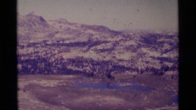 1975: a small serene lake which is nestled in the mountains MINARET WILDERNESS