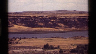 1972: a water flowing calmly with no people around HOLLAND LAKE MONTANA