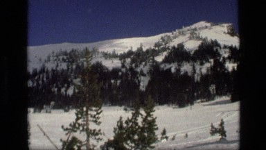 1972: A Snowy Winter Landscape with Mountains and Trees in Idaho