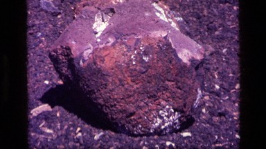 1972: a rocky mountain which has some stones spreaded over it IDAHO