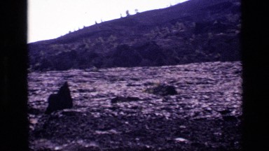 1972: flat lava flow with hills beyond IDAHO