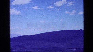 1972: a vast blue hill lying under the blue clear sky IDAHO