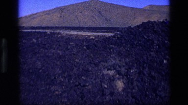 1972: a large area with lots of stones and a mountain around IDAHO