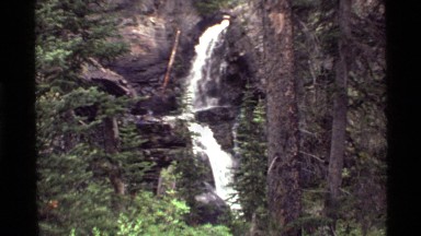 1972: stair-step waterfall over a rock substrate in a forest HOLLAND LAKE
