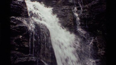 1972: rough water falls rapidly into the river waiting below HOLLAND LAKE