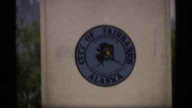 1977: sign: city of fairbanks alaska elaborate mileage to cities ALASKA