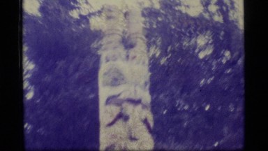 1977: a large area with buildings, water and a mountain around ALASKA