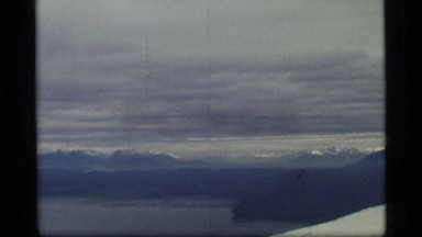 1977: a new plane flying over the water's edge GLACIER BAY ALASKA