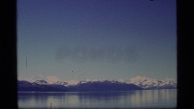 1977: a landscape view of a group of icebergs floating on a river ALASKA