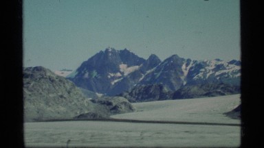 1977: a large area with lots of grass and a mountain around GLACIER BAY ALASKA