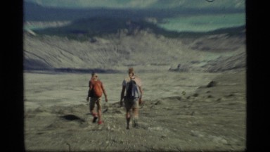 1977: men hiking through some land GLACIER BAY ALASKA