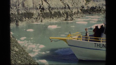 1977: Boat Approaches Shore as Men Carry Luggage Near Glacier Bay