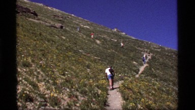 1977: number of people walking on a large mountain area SAPPHIRE LAKE MONTANA