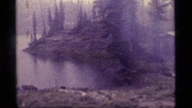 1977: a tiny cottage located next to a water body on a chilly morning SAPPHIRE