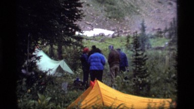 1977: several people camp with tents on the side of a mountain SAPPHIRE LAKE