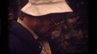 1977: man and woman stand in forest SAPPHIRE LAKE MONTANA