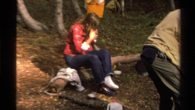 1978: a group of people whose setting up a camp in the middle of the forest.