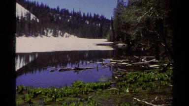 1978: a large area with lots of grass and a mountain around LAKE TAHOE