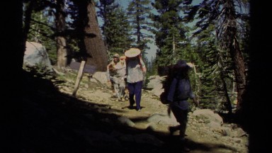 1978: backpackers hiking a trail in the woods LAKE TAHOE CALIFORNIA