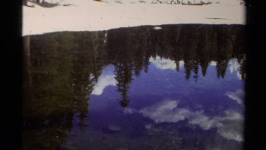 1978: A Still Lake Mirrors the Sky Above Lake Tahoe