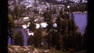 1978: serene bodies of water in the forest with snow and ice on the ground.