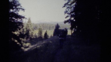 1979: backpackers walking along a beautiful trail in the wilderness