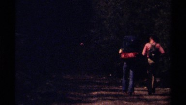 1979: two men trail behind the rest of their group on a hike BRITISH COLUMBIA