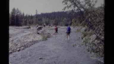 1979: hikers crossing stream BRITISH COLUMBIA CANADA