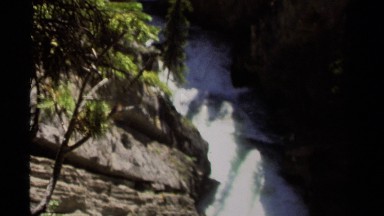 1979: water flows swiftly down the uneven riverbed in the wilderness