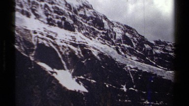 1979: Snow Clings to the Surface and Cracks on a Mountain