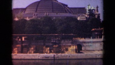 1939: A Survey of a Canal in Paris with a Gondola Floating Down It