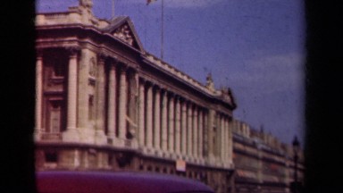 1939: panorama of building and street with parked cars and moving cars PARIS