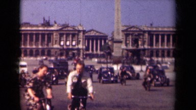 1939: men riding bikes in the street PARIS FRANCE