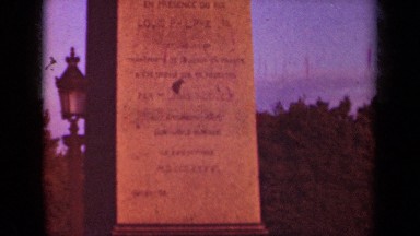 1939: very tall and elaborate stone structure with detailed carvings in it PARIS