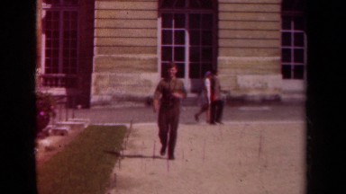 1939: a fit young tourist enjoying his walk on the empty clean street PARIS
