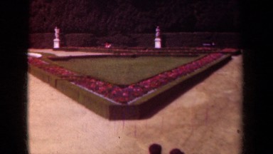 1939: several people walking through a large garden PARIS FRANCE