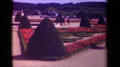 1939: people in the well designed garden PARIS FRANCE