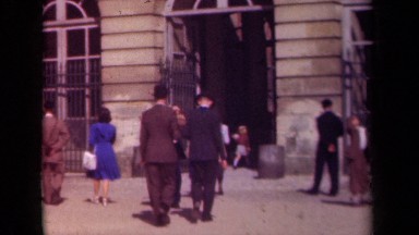 1939: People Walking Into a Building Nicely Dressed Paris France