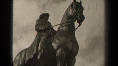 1947: statue of a man riding a horse, commemorating an important person