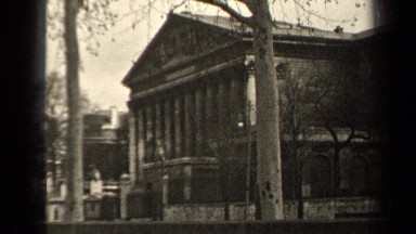 1947: motor traffic passes a building that looks remarkably like the british
