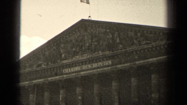 1947: a flag with three stripes waves on the top of a roof PARIS FRANCE
