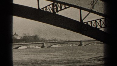 1947: three arches are seen under a bridge running across a river PARIS FRANCE