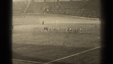 1947: youth soccer team running to the middle of the soccer field PARIS FRANCE