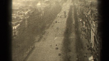 1947: a bustling city street seen above from a rooftop PARIS FRANCE