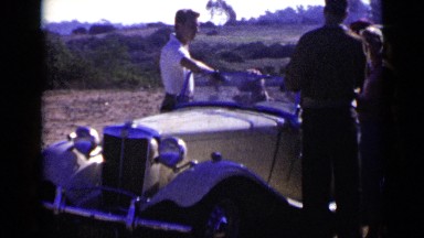 1952: People Discussing in Zeep Car in San Diego