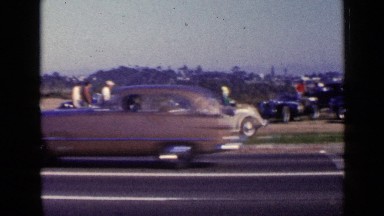 1952: people looking at cars. SAN DIEGO