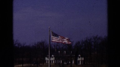 1947: Flag of USA Waving at Military Camp in New York