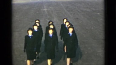 1947: people gathered and walking on road NEW YORK